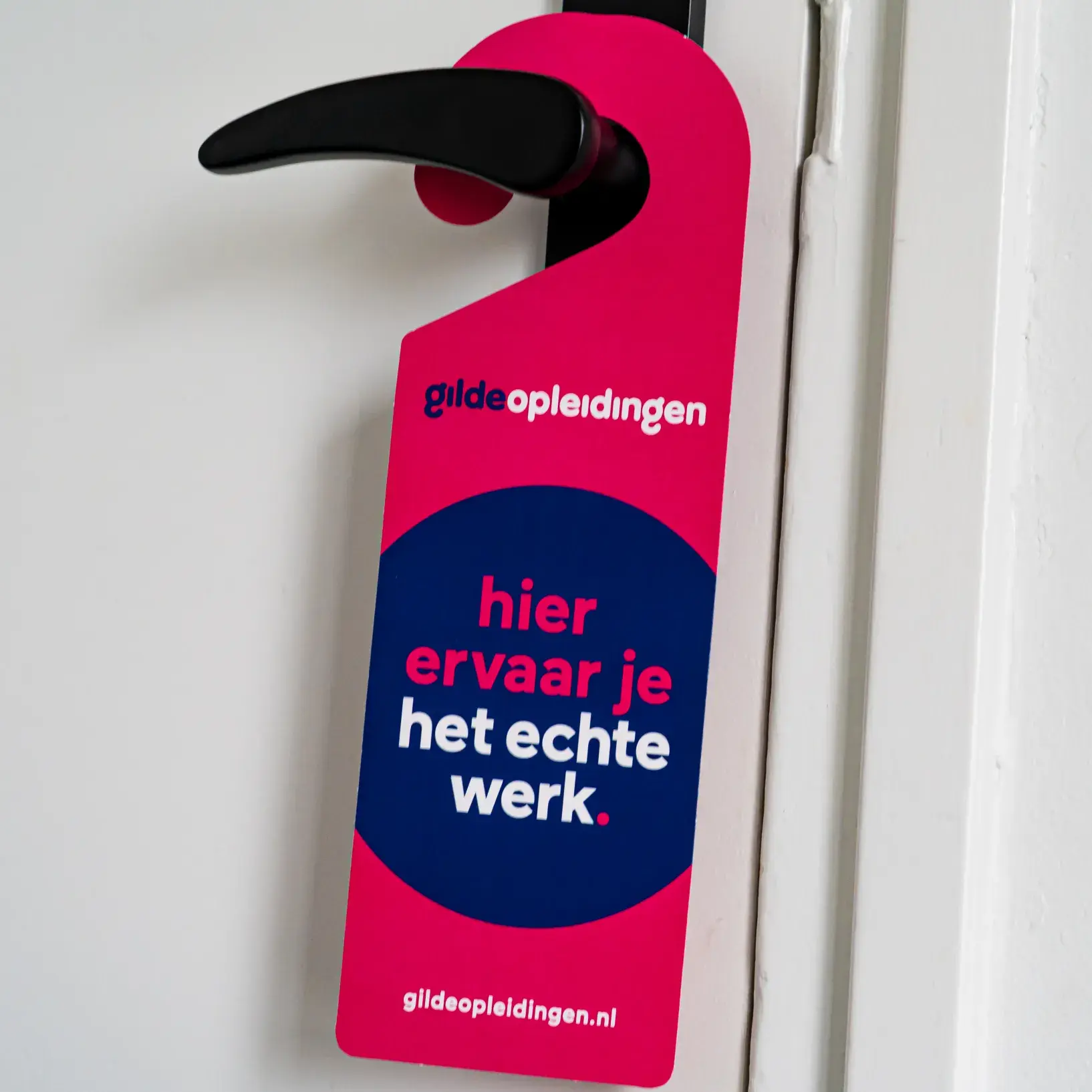 Ervaar het echte werk - deurhanger